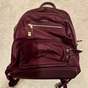 Tumi Maroon Backpack with Gold Accents